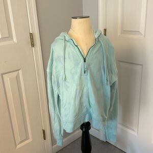 This is a blue tie dye hooded quarter zip from Vineyard Vines in a size medium.